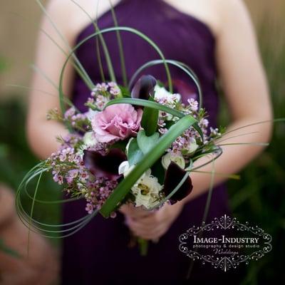 Sheer Elegance with lily grass, lisanthus and wax flowers