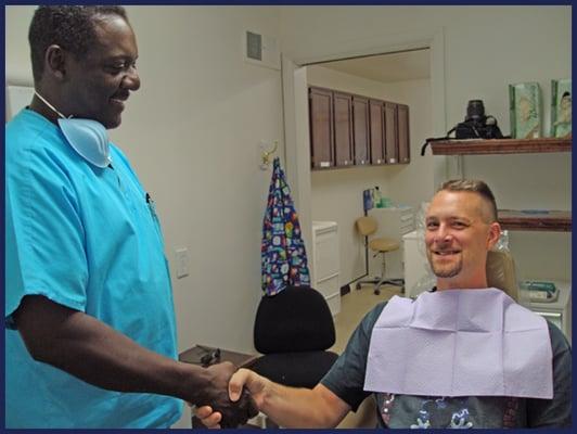 Dr. Harden and a patient.