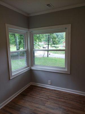 New flooring,  painted windows and walls