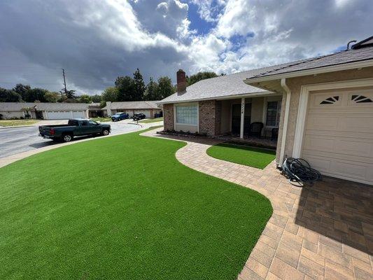 Pay driveway, paver walkway, and Artificial Grass