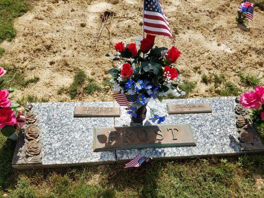 Notice how the headstone is placed to the side and also has been cracked and all the brass comes off the stone and they said it's bc of weat