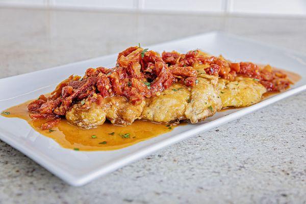 Chicken francese with lemon butter sauce and sundried tomatoes