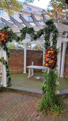 The outside garden wedding gazebo. The flowers were by the recommended vendor!