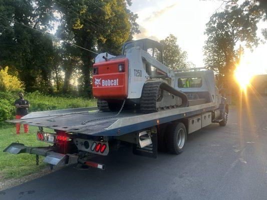 Early morning dropping off a customer equipment at the job site