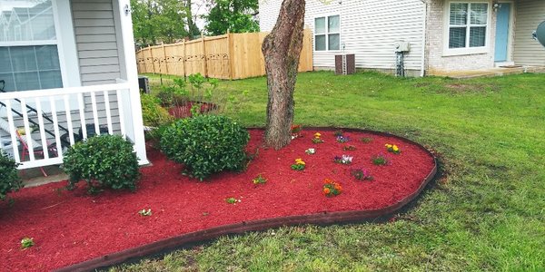 Out with the old, in with the new. Fresh Mulch. Plus New Border