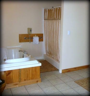 Honeymoon Suite has a jetted 2 person bathtub and a double headed shower.