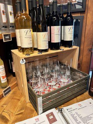 Wine Glasses and Book to Look up Info on the Wines