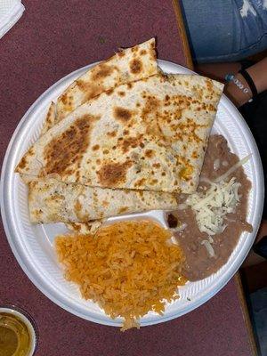 Quesadilla with pastor, rice & beans.