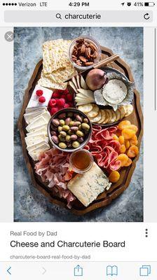 Here is the real charcuterie - thin cheese, meat and crackers, olives. Etc