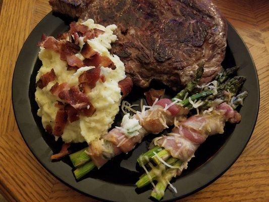 Our amazing meal with their rib eye steak and bacon.