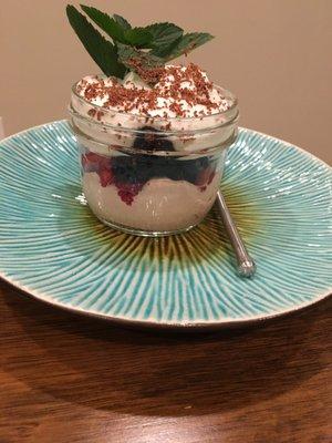 Coconut cream mousse with local berries and mint.