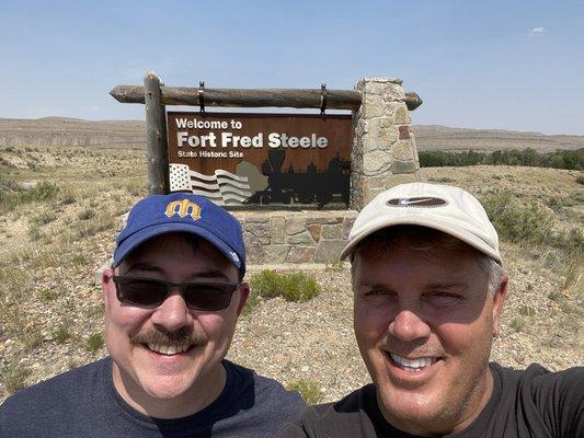 The sign coming into the fort area. Me and hubby.