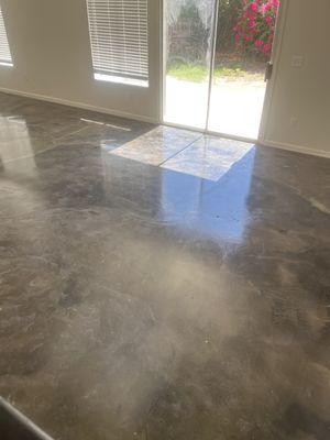 Concrete floor overlay with stain