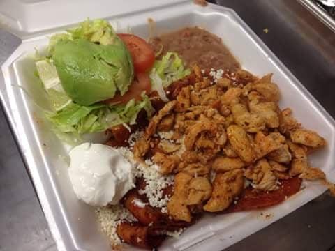 Enchiladas with chicken, sour cream, salad and beans. $10.00 plus tax, there are awesome!!!