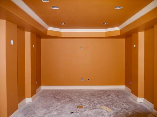 Theatre room with soundproofing materials used. Colorful!