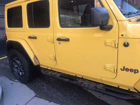 This is a stock Jeep running stock wheels and tires. It didn't get the rock rails or fenders clean.