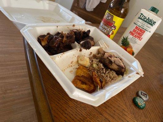 Ox tails and jerk chicken combination plate. Tru Juice and pineapple ginger drink!!!!! Man to die for, everything was just right.