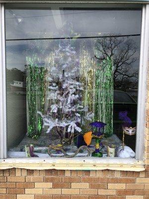 Mardi Gras Beads, Plush Throws , Lightups Novelty Items.