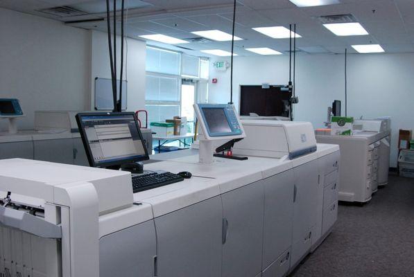 Skymail's printing department featuring digital printers.