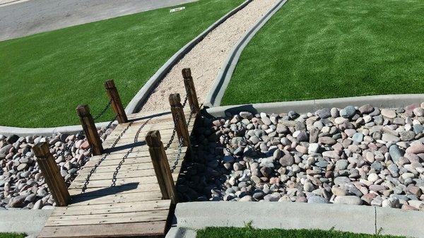 Artificial turf with Arizona river rock.