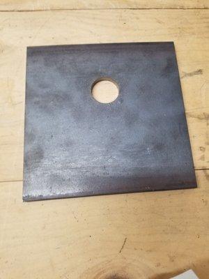 6"X6"X1/4" steel plate that Jim punched a 1" hole through. I tried using a step bit, but wasn't working.