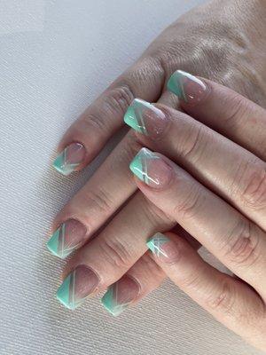 Square nails with rounded edges. Beautiful design by Fin.