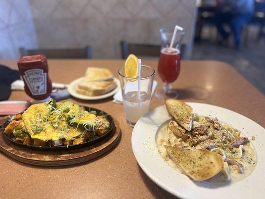 SUPER FIRE , I had to double back   Spinach omelette skillet and chicken Alfredo Yum