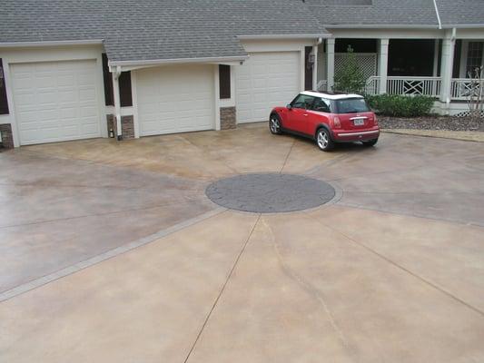 Beautiful drive way finished with stain from Triple- S.