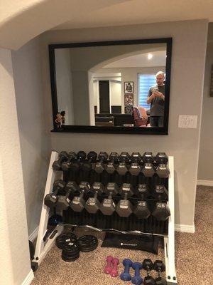 Mirror above my weight set.