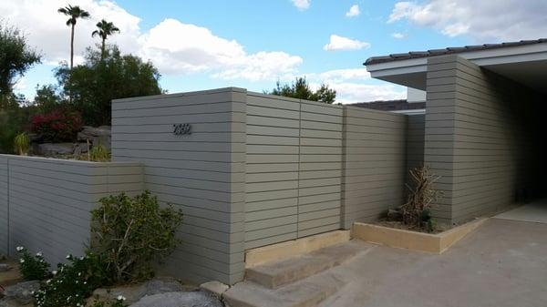 These doors were fabricated to blend in with the block wall