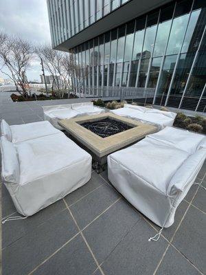 Custom-fabricated seat covers for outdoor patio furniture.