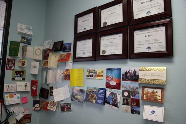 This is the "Thank You Wall", Dr. Grace likes to put up thank you cards from patients here.