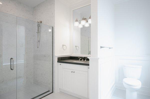 Bright bathroom with a spacious shower stall.  

Apartment 201, 71 New Street, Huntington NY