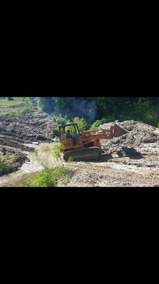 Hard at work installing 2 9ft x 40ft culverts