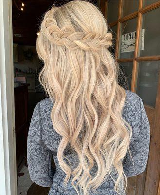 Braided half up style.