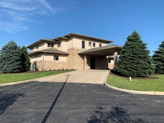 Drive-way view of Tech Credit Union Corporate Center in Crown Point, IN