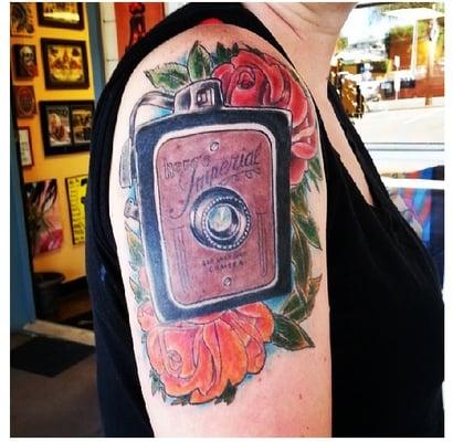 After I told Jason my idea he created this one-of-a-kind tattoo for me to represents love for photography.