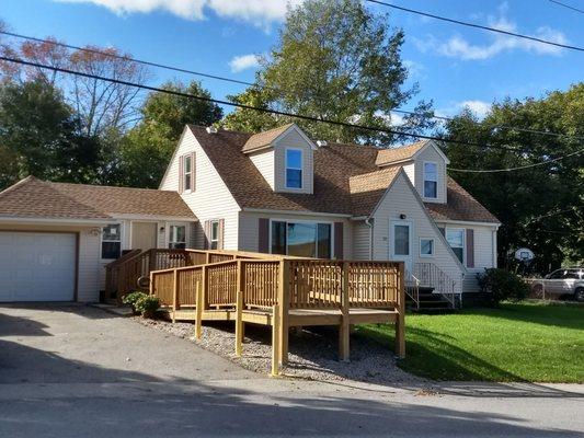 South on Cody St. Showing Dr. Zak Zdenek's building: a one floor townhouse with accessibility ramp from the driveway.