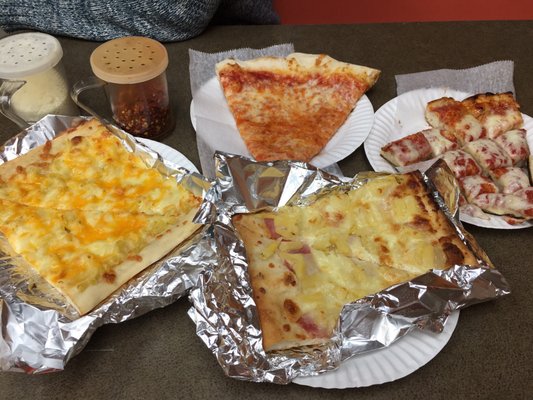 Mac & cheese slice, cheese slice, ham & pineapple, and round Sicilian