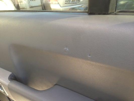 Scuffs on my interior, another gift from Woody's Auto