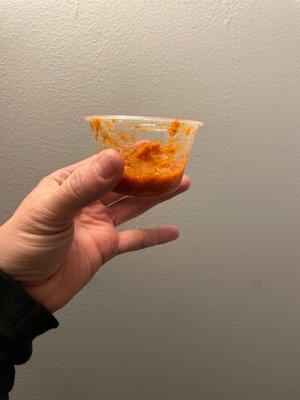 Ordered pickup through the app, this is their idea of a container of salsa. They couldn't even fill it half way!