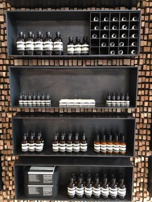 Shelves of Aesop products