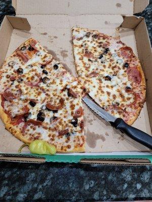 thin crust with pepperoni and black olives