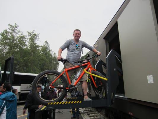 Loading fat tire bike onto train to Fraser.