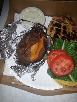 sweet bake potato grilled chicken (on dry bread), coleslaw, old lettuce and tomatoes. I was charged $7.62