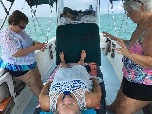 At work on the high seas with our Dancing Dolphins Evolution Therapy service. Receive your healing on the ion rich waters of Key West.