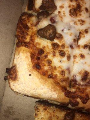 What the hell happen to the crust, yes that is crust on a sausage pizza in the big box. Somebody doesn't know how to make crust nor pizza.