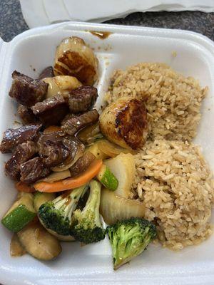 Steak & Scallop teriyaki with rice and veggies.