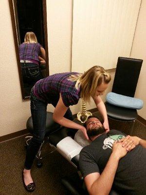 Dr. Ferguson performing a cervical adjustment