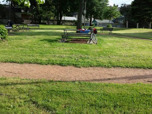 This half acre little economy friendly park has sculptures and a chess table.